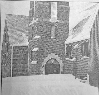 A huge drift left from the blizzard blocks the front entrance to the Callaway United Methodist Church. The Bob and Marcia Keeney family later cleared a path to the doors and cleaned off the parking lot and sidewalks.