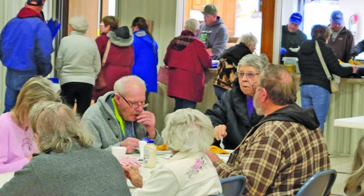 A large crowd from across Custer County and beyond gathered at the Callaway Community Center last Friday evening to enjoy a fish dinner.