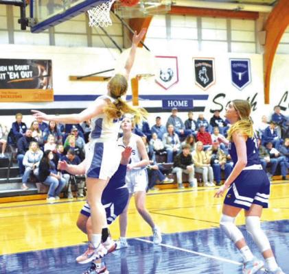 Josie Reiff gets an easy lay up in Saturday's win against Bertrand. (Courier photo by Patti Schwarz)