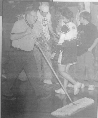 Principal Dave Weber swept his last gym floor at halftime of the game last week, generating a cheer from basketball fans who know he has done this simple duty for years. Weber is retiring after nearly 40 years of teaching and administration in the district.