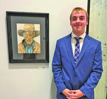 Callaway High School senior Caleb Furrow recently had his artwork selected for a prestigious exhibition at Hastings College. Caleb says he particularly enjoys drawing people with a lot of expression, much like the old cowboy piece he is shown with here. He plans to attend Hastings College next fall on an art scholarship. (Courtesy photo)