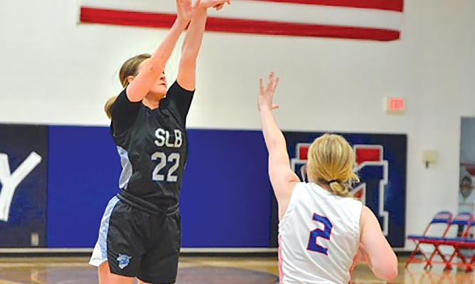Ava Pandorf sinks a three during Friday night's game against Medicine Valley. (Courier photos by Patti Schwarz)
