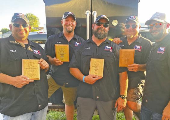 ABOVE: The grill master team of Limp Brisket was crowned the 2025 overall BBQ Champions at the Oconto Blowin' The Doors Off BBQ on June 7. BELOW: The team of Buk-N-Pig was named the best ribs and also placed in the specialty, pulled pork, and sauce categories to finish in second place overall. (Photos courtesy Brett Eggleston)