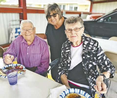 Cecil Woodward, Carol Lehmkuhler, and Jo Keyser enjoy conversation and a pancake supper in Callaway on May 22 at the Grand Generation Manor. (Photo courtesy Janel Brestel)