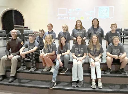 Callaway sixth grade students recently completed the D.A.R.E. program and were recognized during a special ceremony last week. The students are: Waylon Bollig, Olivia Doggett, Fayth Duckett, Kennedy Eggleston, Paige Fedderson, Wyatt Fetters, Kyler McDaniel, Elizabeth Phelps, Brianna Quitmeyer, Georgiee Smith, Graciee Smith, and Elijah Trotter. The class is pictured with Custer County Sheriff Dan Osmond. (Photo courtesy Callaway Public School)
