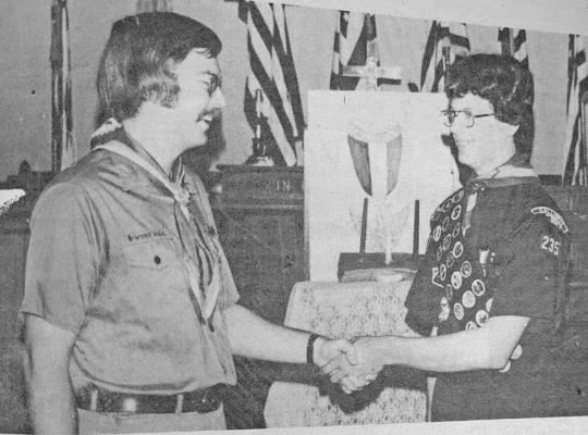 Congratulating Jeff Headley after receiving his Eagle Scout Award is Scoutmaster Leon May of Troup 235 in Callaway.