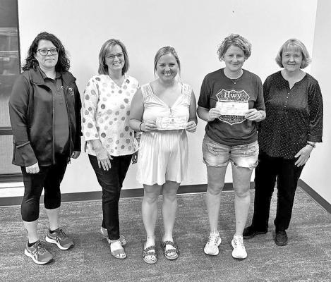 The local Salvation Army presented checks on June 2 to Custer County communities for their swimming lesson programs. From left are Custer County Salvation Army members Adrienne Grafe and Connie Scott, with pool representatives Shavonne Schacher of Arnold and Brandi Cunningham of Ansley, and Salvation Army member Carol Allen. Other check recipients (not shown) were Callaway and Broken Bow swimming lessons, Sargent, Arnold and Ansley food pantries and Prairie Pioneer Center. (Courtesy photo)