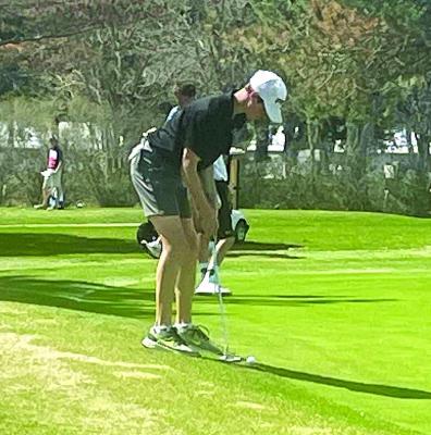 Brady Brestel squares up for a putt.