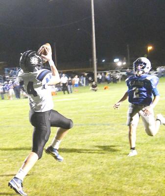 Crew Witthuhn goes out for a pass in the endzone Thursday evening at Hyannis.