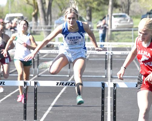 Charli Vickers crosses the last hurdle in second place to earn a trip to Burke Stadium in the 300 hurdles.