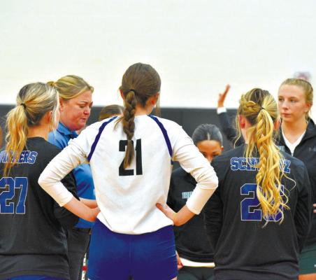 South Loup volleyball senior captains, from left, Charli Vickers, Delaney Rogers, and Bryn Schwarz in their final coin flip. (Courier photo by Patti Schwarz)