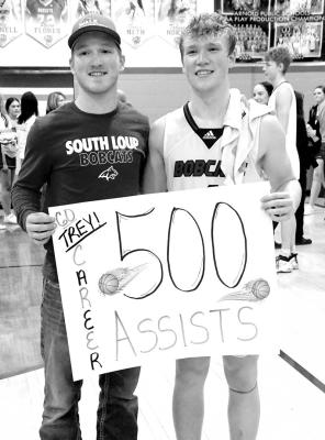 Trey Connell surpassed 500 career assists Friday night Pictured with Trey is his older brother, Jace, who has also held the career assist record in the past. (Courier photo by Leta Connell)