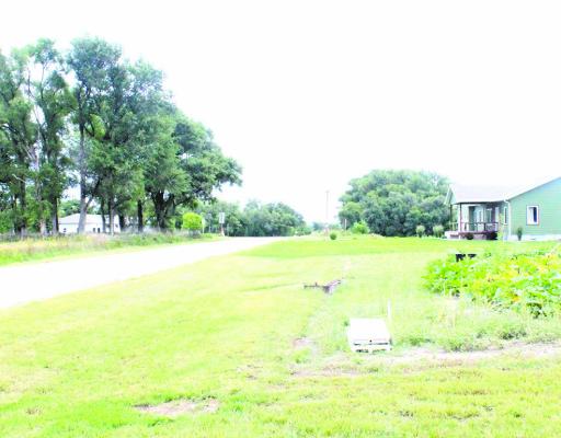 A piece of property on the north side of the Callaway River Road will soon be developed to make way for as many as six new homes. The development is the undertaking of Justin Mason and TJ Elliott. (Courier photo by Ellen Mortensen)
