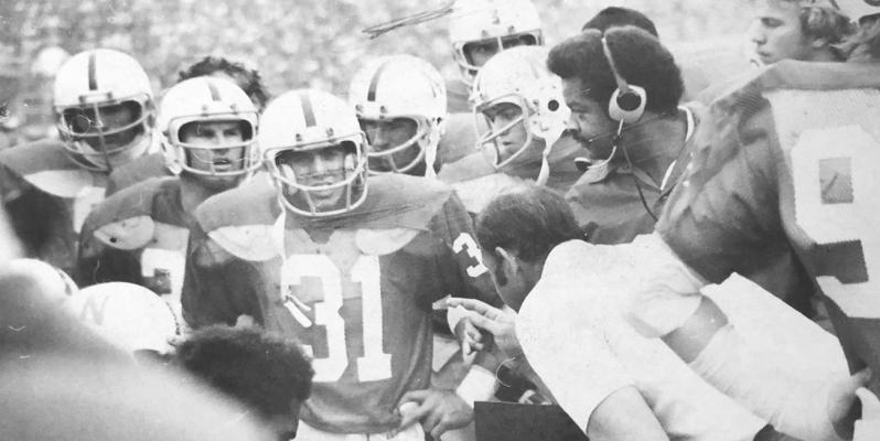 Lexington native Ted Harvey, #31, leads the Huskers onto the field during his career in the mid-70s