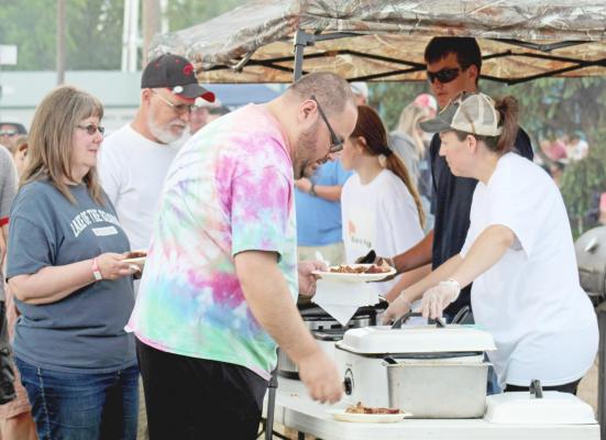 There was plenty of food to go around, as between the 11 BBQ cookers a total of 1,115 people were fed at the annual Blowin’ the Doors Off BBQ held June 4. (Courier photos by Ellen Mortensen)