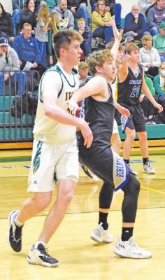 Senior Colbi Smith gave it all he had, but was a little outsized Feb. 22 by North Platte St. Pat’s Brecken Erickson.