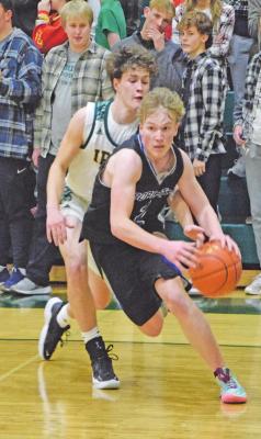 Trey Connell take advantage of an open baseline during subdistrict play at in North Platte.