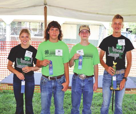 ABOVE: Blue ribbon winners in senior division poultry showmanship were: (from left to right) Rilyn Schledewitz, Oconto, Ty Kennicutt, Bertrand, Austin Kennicutt, and Gage Schledewitiz, Oconto.
