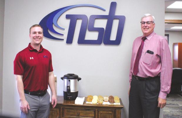 Jacob Parsons, left, is taking over as the new loan officer for the Nebraska State Bank Callaway branch. He will be replacing Craig Barta, right, who has served the community for nearly eight years. (Courier photo by Ellen Mortensen)
