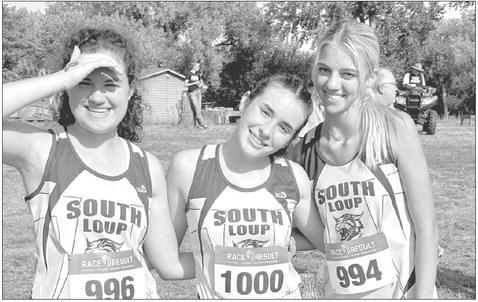 From left, Gracie Neth, Ivy Tullis and Ella Cool finished 22nd, 8th and 10th respectively at the Champan Cross County Invite.