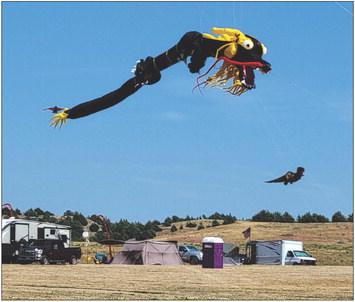 The vehicles below give a good perspective as to the size of the large dragon kite that was visible from a couple of miles away.