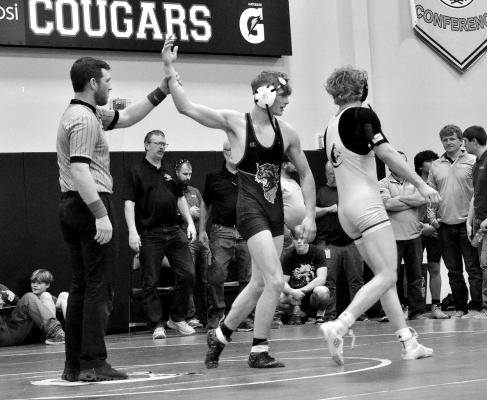 CJ Quandt picks up a win for the Bobcats at 138 pounds. (Photo courtesy South Loup Sports)