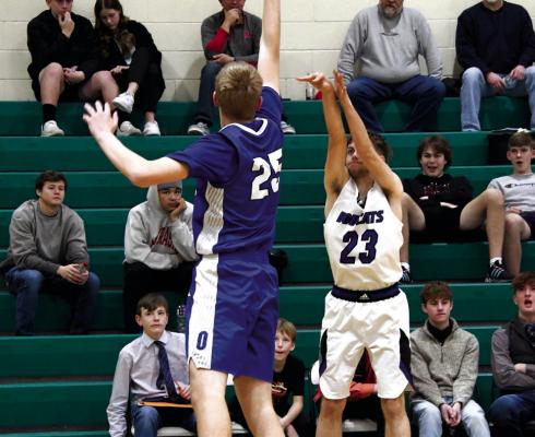 #23 Senior Silas Cool gets the step on Eagle defender #25 Junior Braden Fleischman and lets it fly.