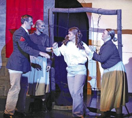 Greta (Chenney Dishman) becomes so disillusioned by Hitler that she turns in her own sister, and watches as Lise (Alley Jorgenson) is arrested by the Commandant (Caleb Furrow) and Marga (Ashly Denney).