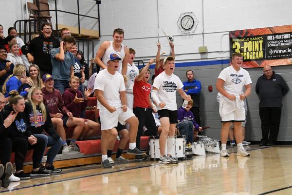 The Bobcats go wild cheering on the musical chairs champ.