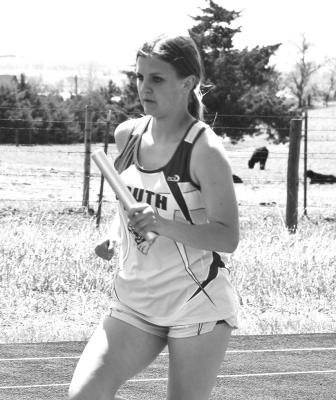 Ava Pandorf runs the second leg in the girls 4x800 relay consisting of Erin Fitzgerald, Pandorf, Ella Cool and Ivy Tullis finishing in 1st at 11:01.39. (Courier photos by Loleta Connell)