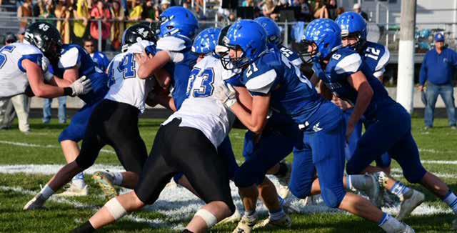 #33 Junior Joey Sallach, #44 Freshman Crew Witthuhn and #45 Junior Rio Remund's hard work paid off as the Bobcats dominated the line both offensively and defensively. Photos Courtesy of Loleta Connell