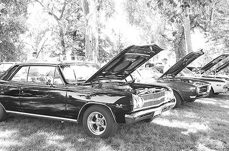 ABOVE: The car show held in Morgan Park in conjunction with the Pioneer Picnic is always a big attraction. Several of the vehicles also enter the parade, like the pickup above which was named best car one year. (Courier file photos)