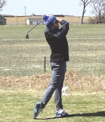 2-2 Golf - Colbi Smith watches his tee shot on April 11 at Arnold Country Club at the South Loup Invitational. Smith won the meet, shooting a 78 on the day. (Photo courtesy of Jarod Rush)