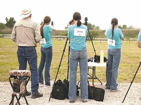 Competing at the 4-H shooting national competition in Grand Island were, from left, Coach Mike Lehmkuhler, Josie Lehmkuhler, Kelynn Witthuhn, and Kaygan Witthuhn. (Photo courtesy Ann Lehmkuhler)