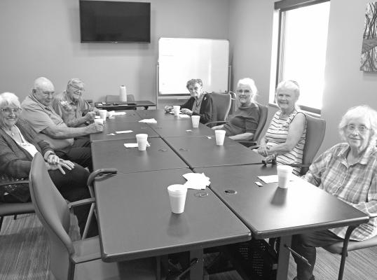 Callaway community members enjoyed cake and conversation during the Senior Life Solutions open house on Thursday, May 23. (Courier photo by Ellen Mortensen)