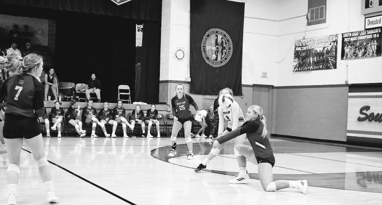 South Loup senior Lauryn Johnson takes a deep dig against Brady last Tuesday at the Bobcat home triangular. The Bobcats won 2-0 against Brady, 25-10 and 25-15.