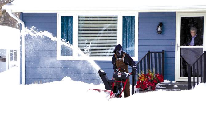Callaway citizens jumped in to help neighbors and the village crew in cleaning up after a massive snowstorm hit the area on Wednesday, Jan. 18. (Photo courtesy Janel Brestel)