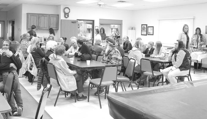 A good turnout of community members were in attendance for the presentation of the Callaway Chamber Citizen of the Year award on Sunday evening. The event inclluded a potluck supper, with beef sandwiches provided by the Callaway Chamber of Commerce. (Courier photo by Ellen Mortensen)
