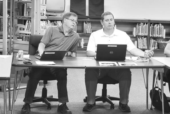 Pictured are Callaway school board president Mike Reiff and Superintendent JD Furrow during a board meeting. (Courier file photo)