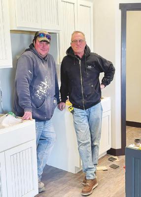 Justin Mason, left, has worked for many years with Lane Chesley, right, owner of Design Homes. (Photo courtesy Janet Kalinowski)