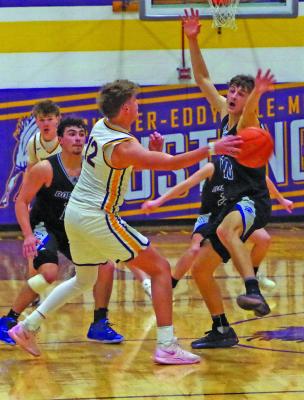 Conner Paulsen, left, and Dylan Pandorf put pressure on Chance Daake of S.E.M. as he attempts to pass the ball inside.
