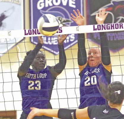 The Lady Bobcats volleyball team competed in a jamboree in Burwell on Thursday, Aug. 21. The pre-season matches were a great opportunity to get some on-court experience for the young team. Here Nyachay Haidle and Asa Starr go up for a block. The Lady Bobcats officially kicked off the 2025 fall season on Tuesday, Sept. 2, as they hosted a triangular with Mullen and Anselmo-Merna in Arnold. (Photo courtesy Ronda McFate)