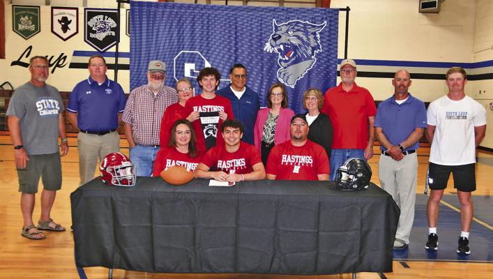 Conner Paulsen, a member of the Class of 2026 at Callaway High School, has signed his letter of intent to play football at the next level. On Thursday, April 16, Conner signed to play football next fall at Hastings College. Conner is the son of Heath and Stephanie Paulsen. He plans to pursue a degree in physical education. (Courier photos by Leta Connell)