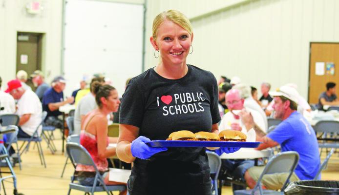 Brittany Jesseph is the new elementary principal at Callaway Public School, and is already integrating into the community. Here she was helping serve the drivers and crews during the SORC luncheon at the Callaway Community Center on Friday, Aug. 12. Courier photo by Ellen Mortensen