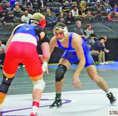 Paxton Bierman faces off against Hunter Gall of Clarkson-Leigh at the state tournament, in what would be Bierman’s final match as a Bobcat wrestler. (Courier photos by Brandy Mason)
