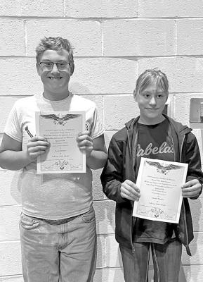 Class VI winners of the Americanism contest were Aaron Johnson and Natalie Thomsen.