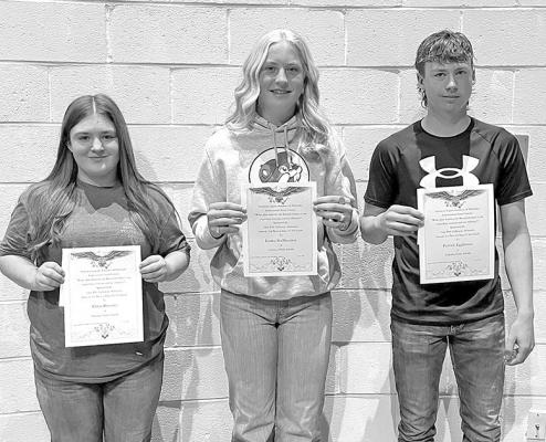 Winning the 9th grade Americanism contest were, from left, Chloe Bloomer, Emma Stallbaumer, and Patrick Eggleston.