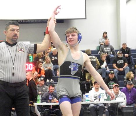 Dawson Mason has his hand raised in victory as he won the gold medal at the Central Valley wrestling tournament in Greeley on Friday, Jan. 31. (Courier photo by Brandy Mason)