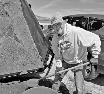Pictured is ALCC owner, Jerry Adams, helping to shovel compost during last year’s Adams Compost Days. (Photo courtesy ALCC)