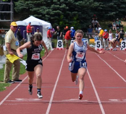 Bryn Schwarz gives it all she has in the 100 meter dash prelims (Courier photo by Loleta Connell)